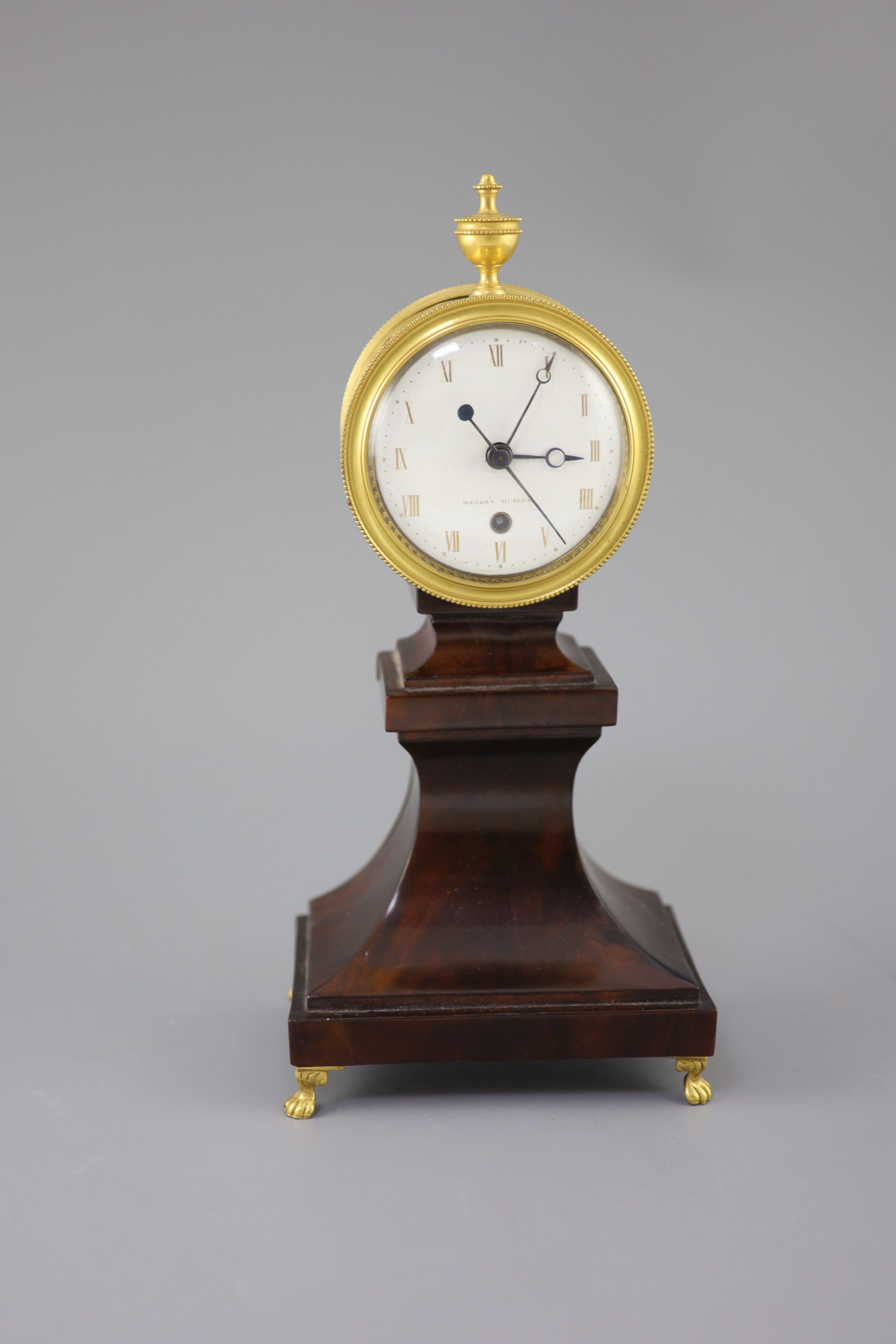 Weeks Museum. A Regency gilt brass and mahogany drum case mantel timepiece, height 12.5in.